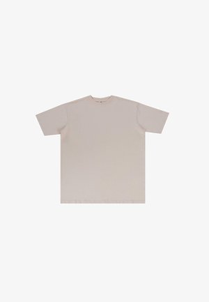 T-shirt à manches courtes en beige clair, en coton, avec un col rond et une coupe décontractée ; sans ornement, texture lisse et sans motifs visibles.