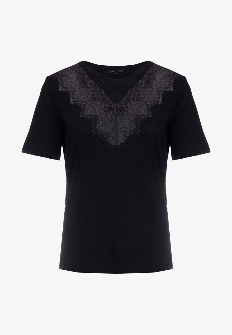 Camiseta negra de manga corta, con un diseño texturizado de lentejuelas oscuras en forma de V en el escote y bordes en forma de ondas.