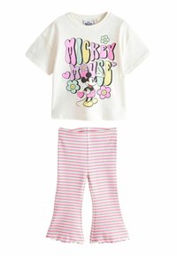 Mickey-Maus-Design Baumwoll-T-Shirt in Creme mit buntem Grafikmotiv und ausgestellt geschnittenen, rosa-weiß gestreiften Leggings mit Rüschensaum.