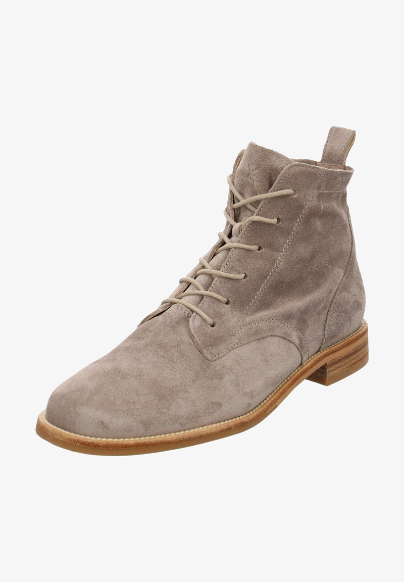 Bottines en daim gris clair avec un bout arrondi, un laçage à l'avant et un petit talon empilé. Coutures visibles le long de la semelle.