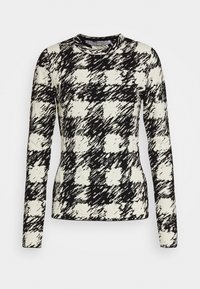 Långärmad topp i svart och kräm med ett hundtandsmönster. Har rund halsringning och texturerad tyg. Slim-fit design.