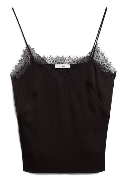 Fekete selyem camisole, állítható pántokkal, csipkés díszítéssel a nyaknál. A kialakítás V-nyakú, és oldalzsebekkel rendelkezik.