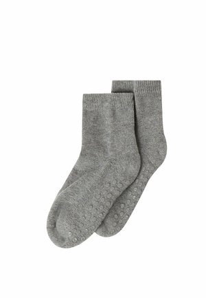 Chaussettes grises en mélange de coton avec une bordure côtelée et des points en caoutchouc texturé sur la semelle pour une meilleure adhérence. Conçues pour le confort et la stabilité.