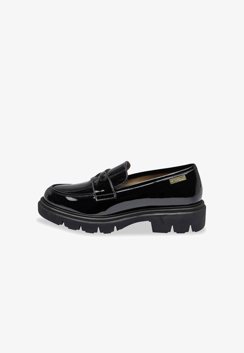 Black patent leather loafers with a rounded toe, flat chunky rubber sole, decorative bow detail, and contrasting stitching accents.