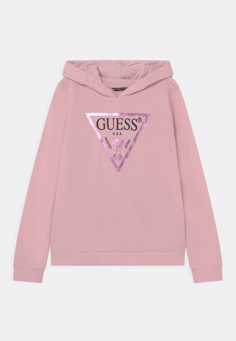 Sweatshirt à capuche rose clair avec logo triangulaire GUESS en rose métallique et texte "U.S.A. Washed Jeans" sur le devant.
