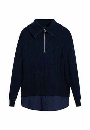 Maglione lavorato a maglia blu navy con motivo a trecce, colletto alto e zip frontale. Presenta uno strato di base di una camicia collare blu scuro sotto.