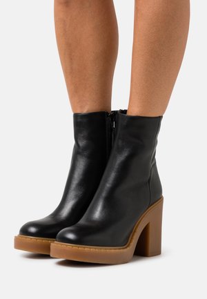 Classic ankle boots - nero