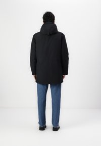Lacoste Ziemas mētelis - black