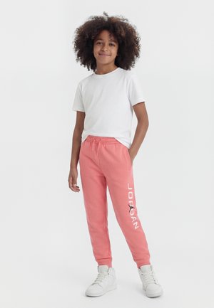 Jordan STRETCH PANT UNISEX - Spodnji deli trenirk - pink gaze
