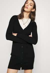 Abercrombie & Fitch BUTTON DEEP MINI - Vestido de malha - black