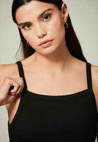 Next STRAPPY  - Maksikleit - black