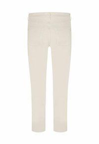 Lichtbeige broek gemaakt van zachte stof met een slanke pasvorm, voorzien van twee achterzakken en een zachte textuur. Strak ontwerp zonder zichtbare hardware.