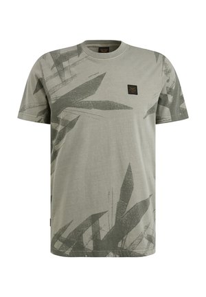 T-shirt verde in cotone con stampa grafica di foglie, collo rotondo, maniche corte e una piccola etichetta con marchio sul lato sinistro del petto.