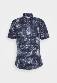 Chemise à manches courtes à boutons en bleu marine avec un motif de feuilles de palmier blanches. Fabriquée en tissu léger, elle possède un col classique et un ourlet droit.