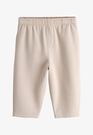 Beige knælange shorts med elastisk taljebånd og diskrete syninger foran, lavet af blødt stof.