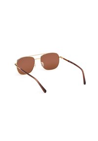 Bruine zonnebril met een gouden metalen frame, met een ronde vorm, bruine getinte lenzen en bruine acetaatsp temples met een lichte curve.