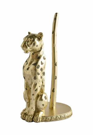 Gold-colored metal leopard figure with black spots sitting next to a tall, spotted vertical rod on a round base.