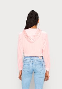 Monki Felpa con zip - pink