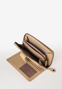 Beige leather wallet with a zip closure, multiple card slots, and a coin pocket. Interior features a smooth lining and a divided compartment.