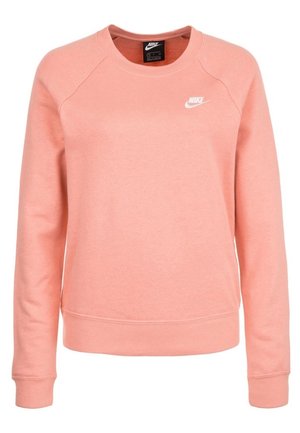 Jasnoróżowa bluza Nike w kolorze koralowym, z długimi rękawami, okrągłym dekoltem i białym logo Nike na lewej piersi.