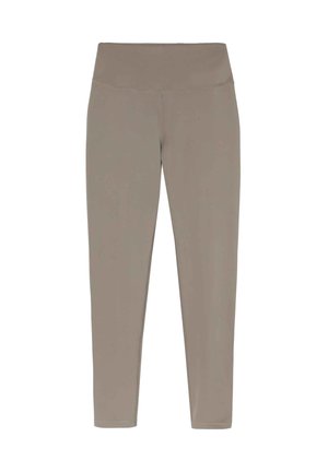 Leggings aderenti di colore beige opaco, realizzati in materiale liscio e elasticizzato. Presentano un alto punto vita e nessuna cucitura visibile.