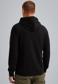 Black hoodie with a relaxed fit and a spacious hood. Features ribbed cuffs and hem, with plain texture and no visible patterns or accents.