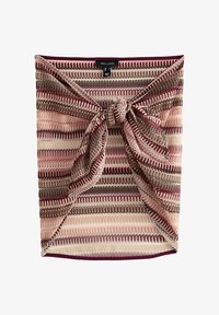 Falda de punto con rayas zigzag horizontales en tonos rosa, burdeos y beige, con detalle de nudo frontal y etiqueta de New Look.