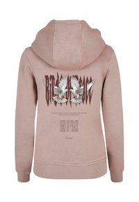 Rózsaszín kapucnis pulóver elülső cipzárral, nagy grafikával, amelyen két galamb látható, alatta a "BÉKE MADARA" felirattal. Puha anyagból készült, laza szabással.