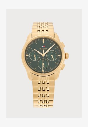 Orologio da polso in metallo color oro con quadrante verde, tre quadranti secondari e lancette dorate su cinturino a maglie dorato.