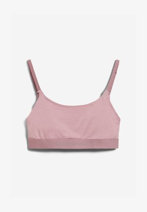 Lichtroze bralette met dunne verstelbare bandjes, een soepele textuur en een zachte band met reliëfdruk van de merknaam langs de onderkant.