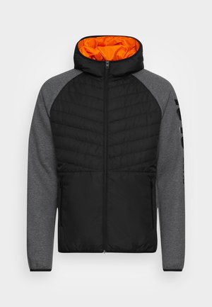 Zwart-grijs jack met ritssluiting, gewatteerd aan de voorkant, capuchon gevoerd met fel oranje stof, en ritssluitingszakken aan de zijkant.