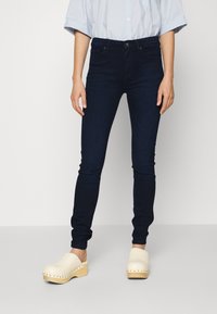Tommy Hilfiger Vaqueros pitillo - black denim