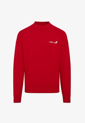 Sudadera roja con cuello alto y mangas largas. Presenta un logo blanco impreso en el pecho. Hecha de tela suave y texturizada.