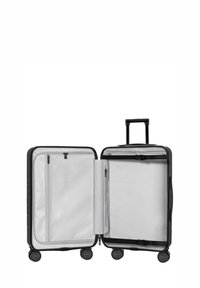 Schwarzer Hartschalenkoffer mit ausziehbarem Griff und vier Rädern. Das Innere ist mit grauem Stoff ausgekleidet, hat eine Netztasche und verstellbare Riemen.