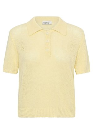 Polo en maille jaune clair à manches courtes avec poignets, col, ourlet côtelés et trois boutons sur le devant.