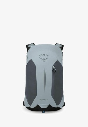 Sac à dos Osprey Hikelite LT 22 gris clair et gris foncé avec poche zippée à l'avant et bretelles.