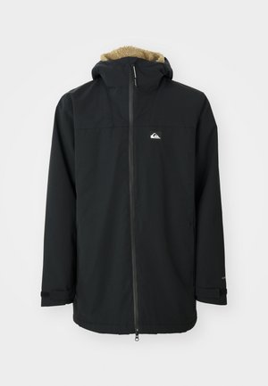 Svart vanntett jakke med en hette foret med pels, frontglidelås og logo-patch. Har lange ermer og justerbare mansjetter. Teksturert stoff.