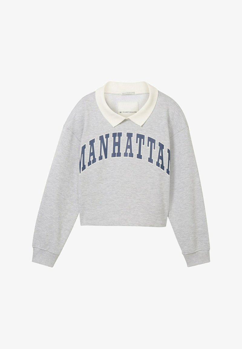 Sweat-shirt court à manches longues gris clair avec col blanc et texte "MANHATTAN" bleu marine sur la poitrine.