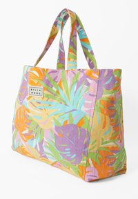 Sac en toile en coton avec un motif de feuilles tropicales multicolores et vibrantes. Dispose de deux poignées et d'une forme rectangulaire.