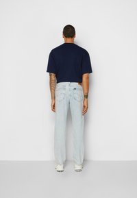 Lee WEST - Calças de ganga de corte relaxado - acid echo bay