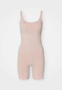Nude bešavne bodystocking s izrezom u obliku suknje, podesivim naramenicama i prilagođenim dizajnom. Materijal je gladak s laganom teksturom.