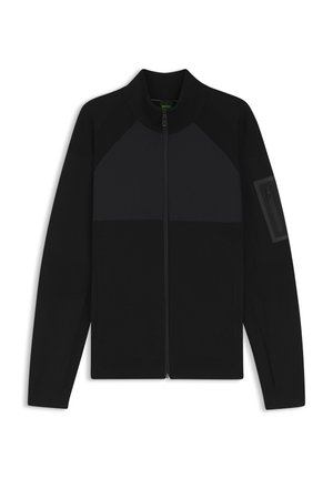 Čierna bunda na zips s vysokým golierom, s farebnými blokmi, textúrovanými panelmi na rukávoch a vreckom na zips na ramene.