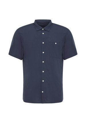 Námořnická modrá košile s krátkým rukávem na knoflíky, s límcem a jednou kapsou na prsou se bílým knoflíkem.