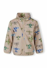 Veste beige pour enfants avec fermeture éclair complète, décorée de motifs d'avions vintage colorés dans des tons verts, bleus et beiges.