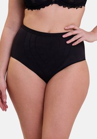 Culotte noire taille haute en tissu lisse, avec des détails de coutures courbes et une taille élastique douce.