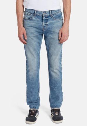 Light blue denim jeans with a straight-leg fit, five pockets, and subtle fading. Belt loops and metal button detailing are visible.