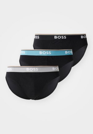 Black cotton briefs with elastic waistbands. One has a light blue band, another a gray band, all featuring the "BOSS" logo prominently.