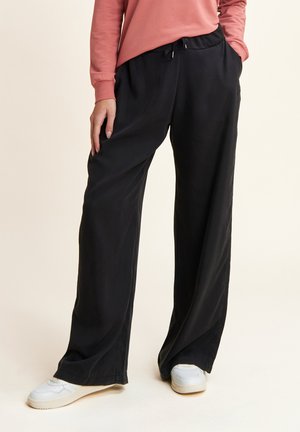 Pantaloni sportivi - black direct dyed