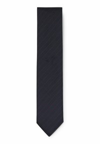 Marineblå slips med diagonale røde striber. Fremstillet af glat stof med en let blank tekstur. Spids ende med en ren skåret kant.