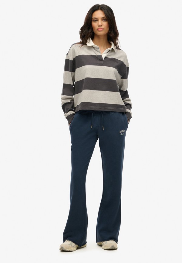 ATHLETIC ESSENTIALS RISE FLARE JOGGERS - Jogginghose